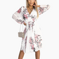 Weißes Blumenkleid mit V-Ausschnitt und Gürtel für Damen